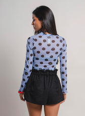 Buso Entre Sombras celeste, vista trasera mostrando el estampado completo