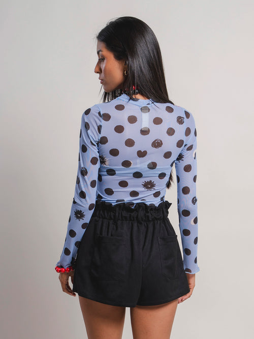 Buso Entre Sombras celeste, vista trasera mostrando el estampado completo