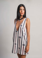 Mini Vestido Fragmentos, detalle espalda en V descubierta con estampado completo