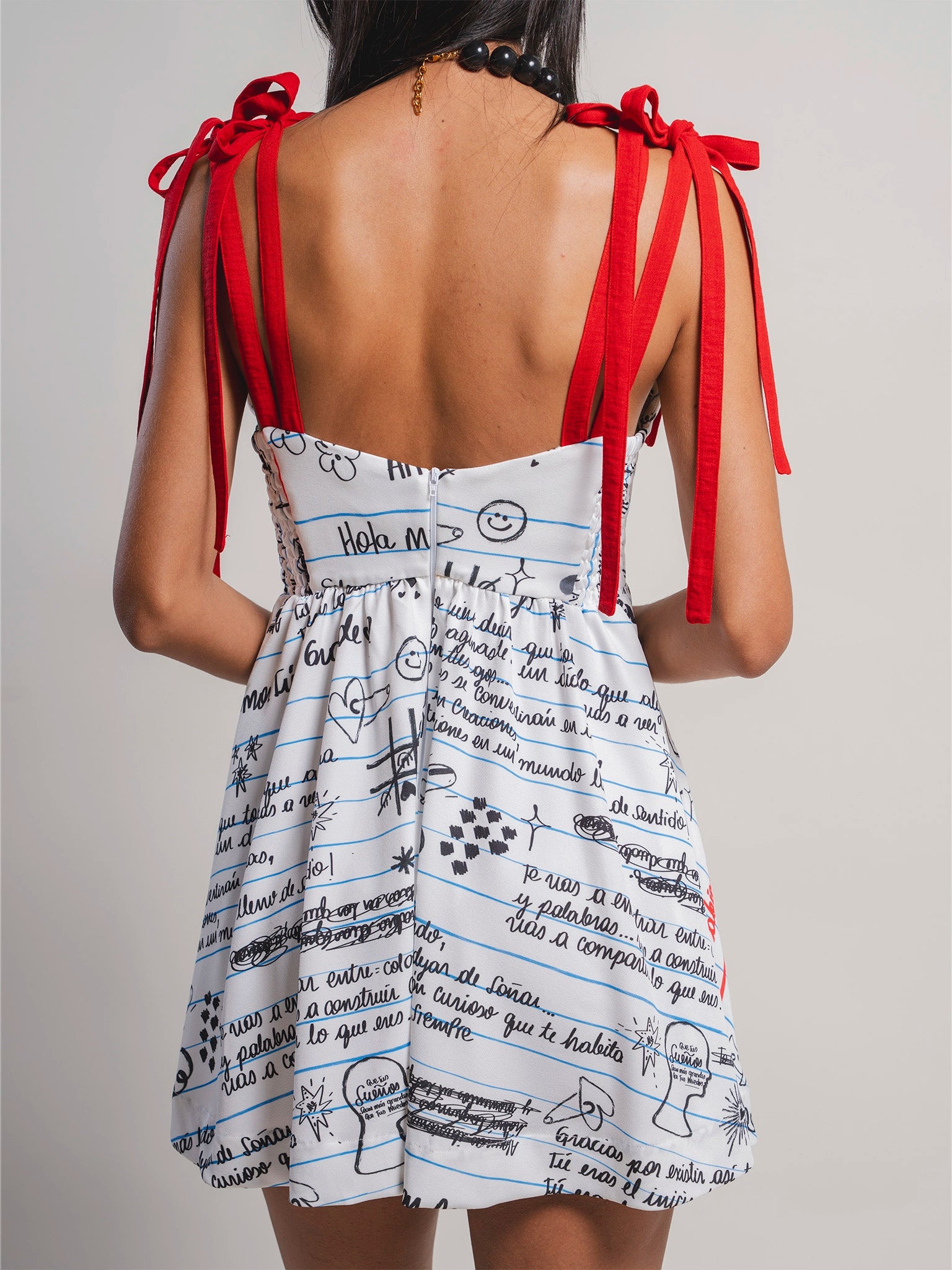 MINIVESTIDO MANIFIESTO