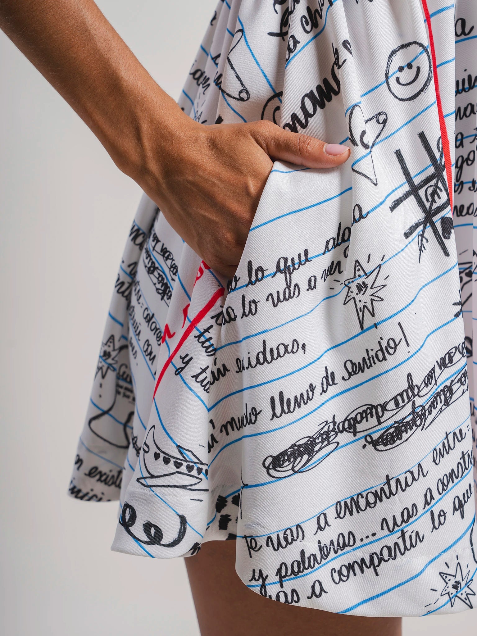 MINIVESTIDO MANIFIESTO