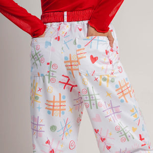 PANT BOTA PUÑO ENTRE RISAS Y TRAZOS