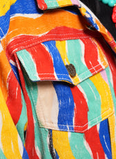 Detalle del bolsillo de pecho y el estampado de rayas de la Chaqueta Denim El Río – Ale Ardila Studios
